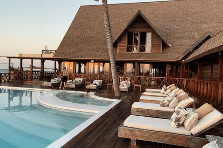 A photo showing a beautiful hotel while showcasing the importance of hiring a housekeeping company to keep things tidy and clean all the time.