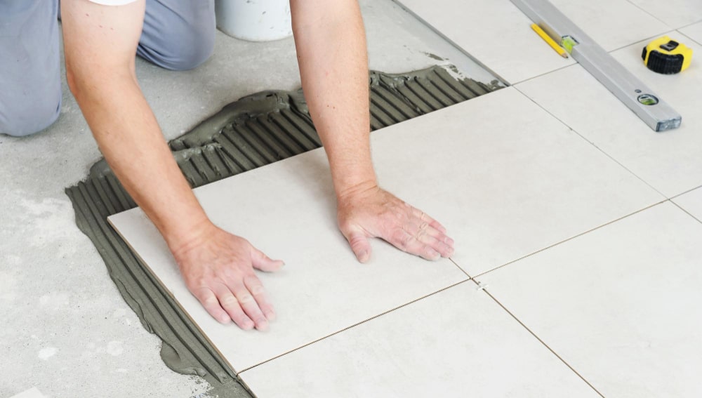 Image illustrating tile replacement services by HBS
