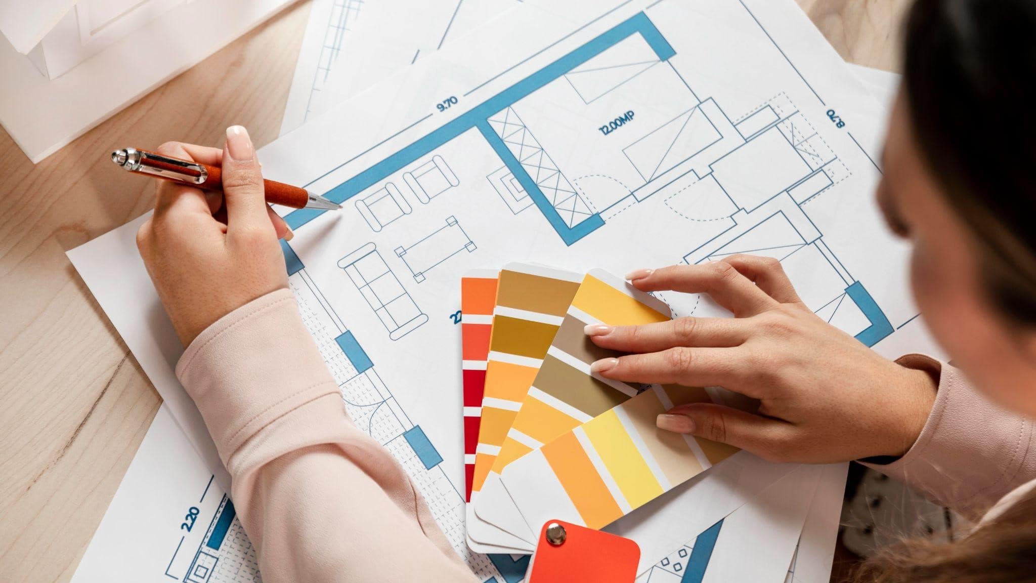 Image illustrating a woman while choosing the colors for the interior remodeling in New York