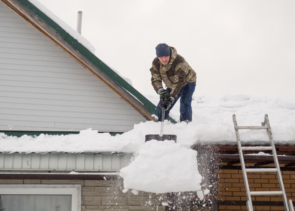 Image illustrating worker doing winter Building Maintenance in New York